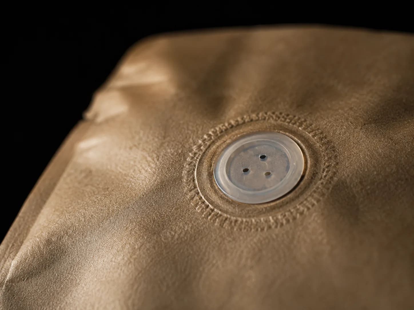 One-way degassing valve welded into a kraft coffee pouch — Sparal Packaging structural detail