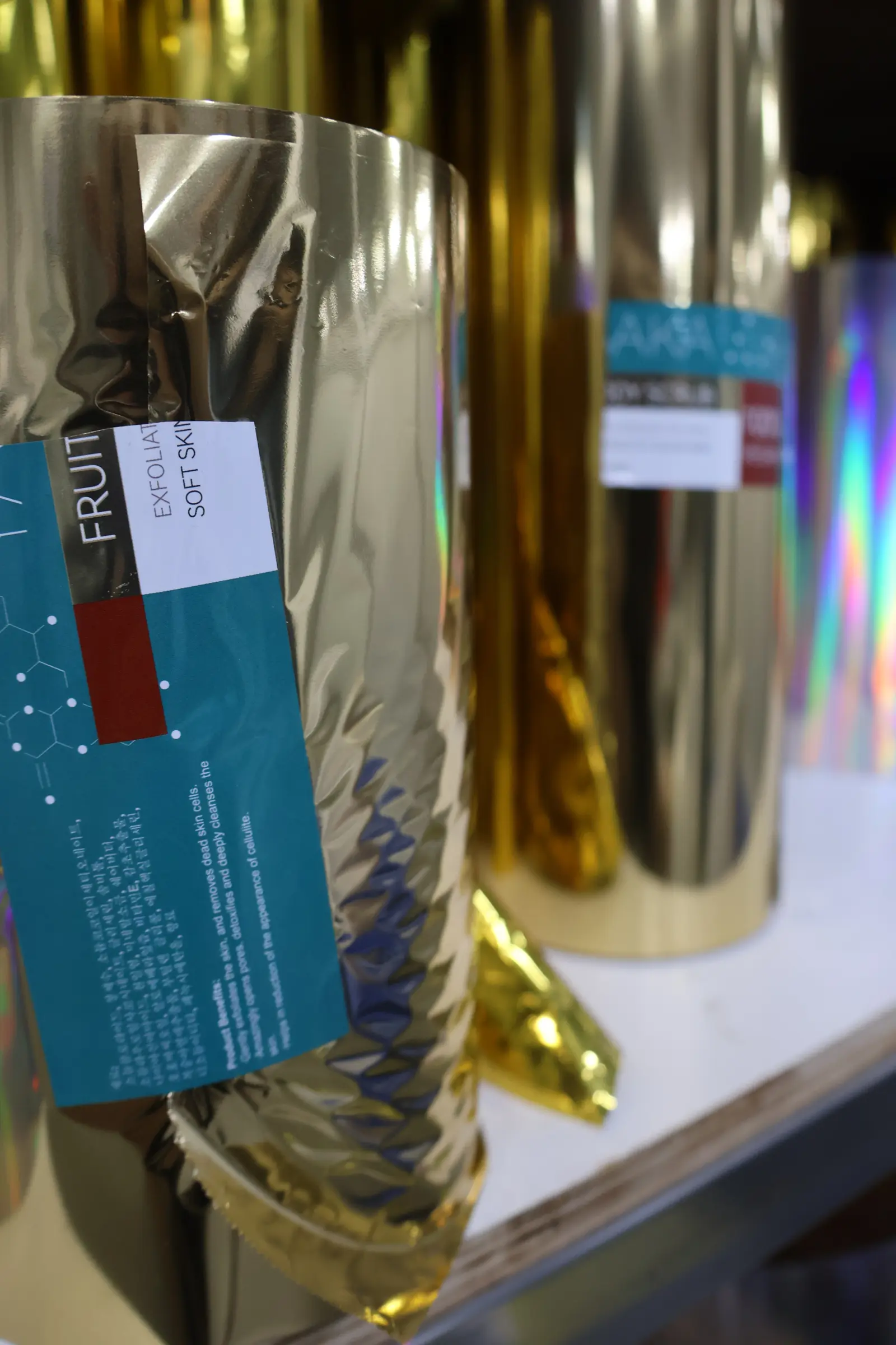 Holographic iridescent film stock for custom pouches at Sparal Packaging