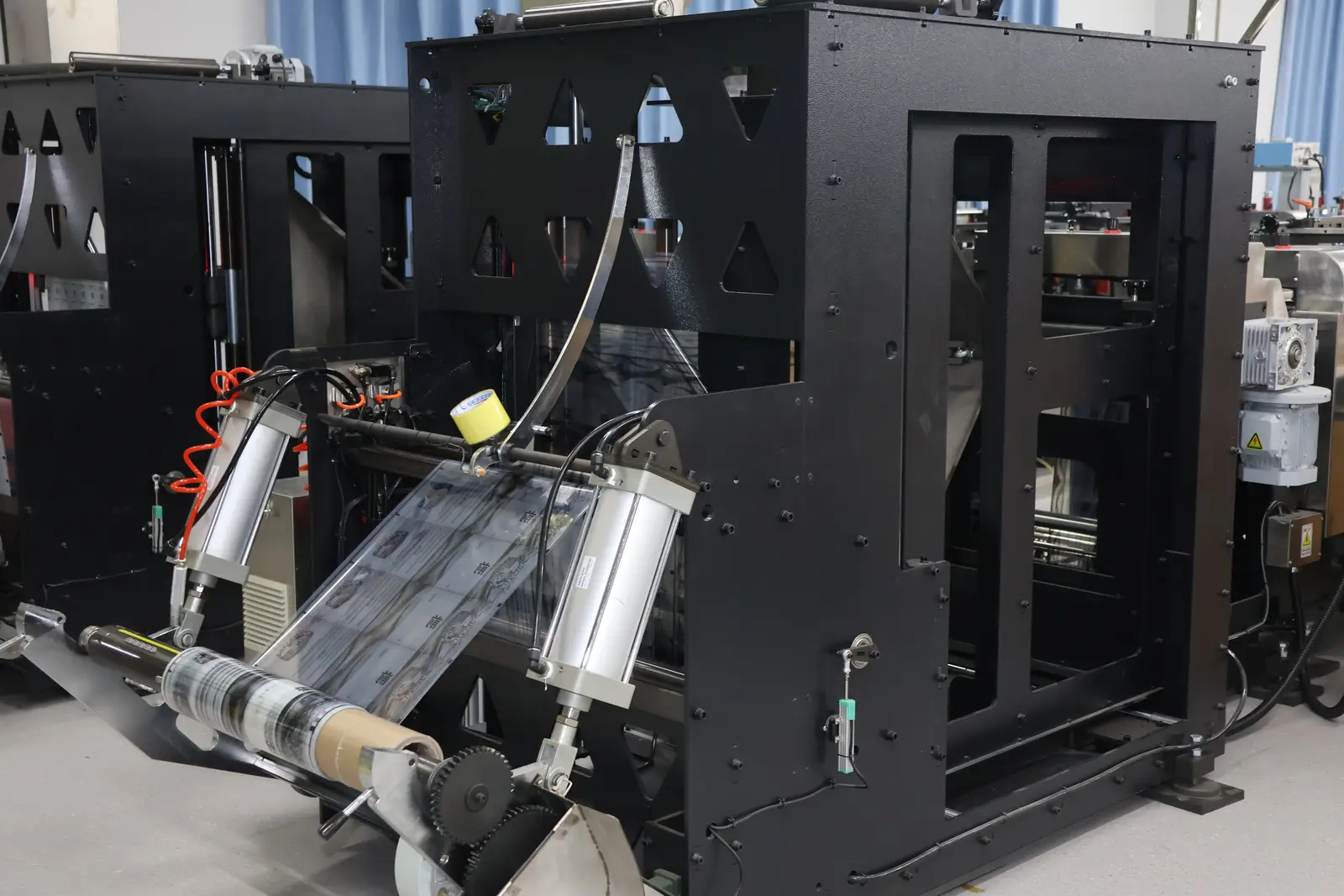Custom-printed flexible film on Sparal Packaging's converting line