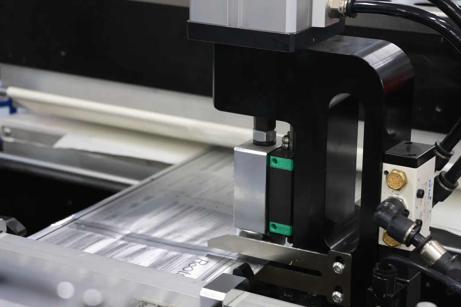 Custom-printed flexible film on Sparal Packaging's converting line