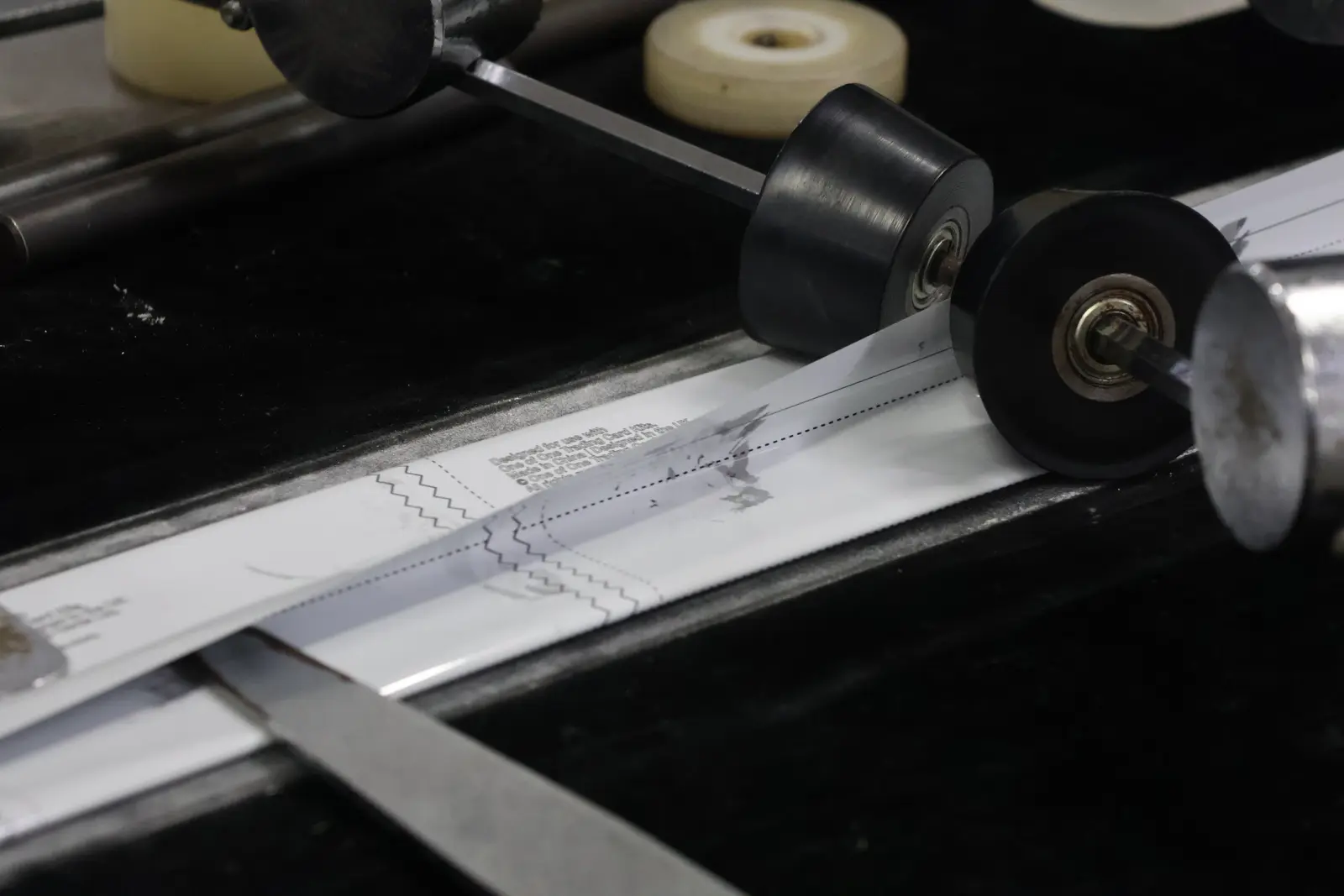 Custom-printed flexible film on Sparal Packaging's converting line