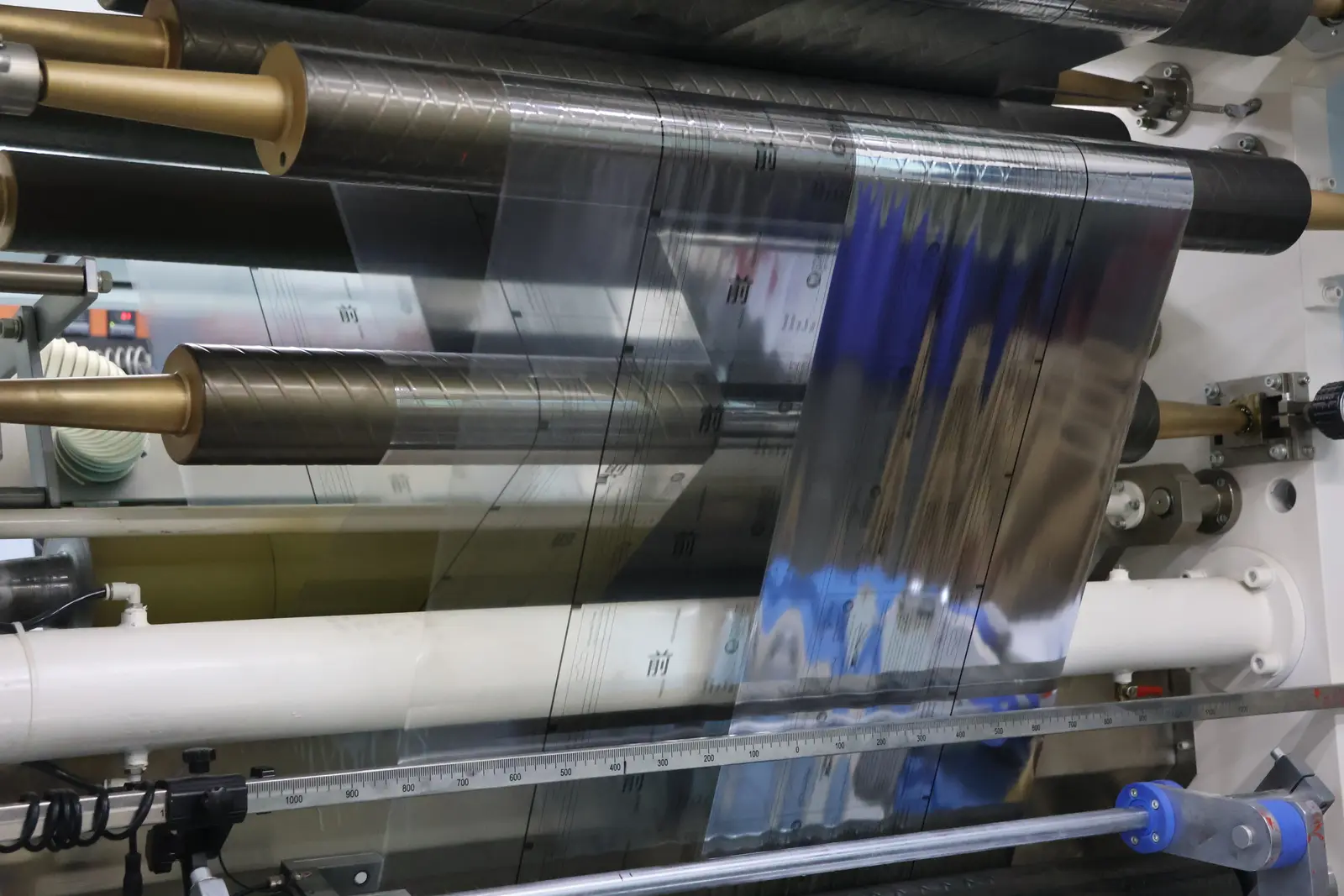 Custom-printed flexible film on Sparal Packaging's converting line